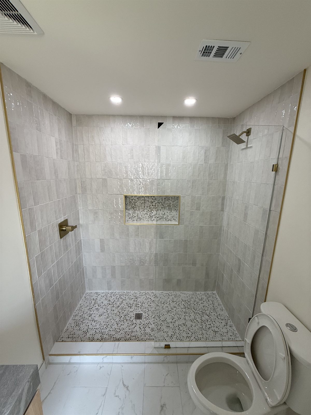 Walk-in shower by 3DCON LLC in the Tampa Bay area